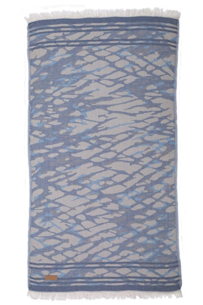 1. Abstrakt håndkle i bomull blå – jacquardvevd og sandfritt
2. Lett og hurtigtørkende økologisk håndkle fra Lalaloom
3. Strandhåndkle i 100 % OEKO-TEX bomull – blå

